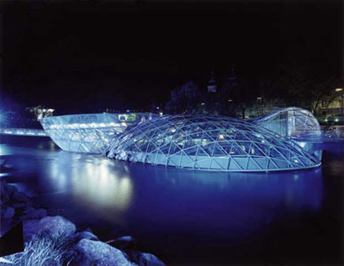 Mur Island at night, designed by Vito Acconci/Acconci Studio, 2003.  Graz, Austria.  Photo: Wolfgang Thaler and Rainer Fehringer, &copy; Art&Idea.