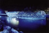 Mur Island at night, designed by Vito Acconci/Acconci Studio, 2003.  Graz, Austria.  Photo: Wolfgang Thaler and Rainer Fehringer, © Art&Idea.