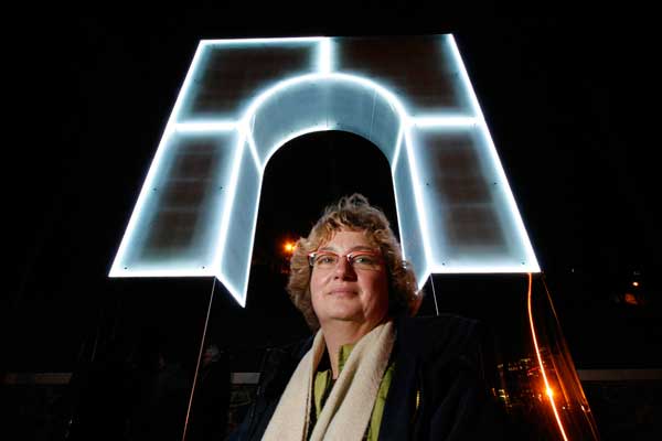 Rise and Fall, Lulu Quinn (who is featured with her sculpture), 2007, 6 metres high, glass and stainless steel with LEDs, with sound engineering by GDS; Photograph: Mark Pinder, copyright Gateshead Council