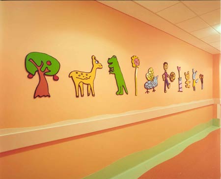 Lacquered cut-outs, crash barrier and skirting designs by Ray Smith, 2001. Bristol Royal Hospital for Children. Photo: Jerry Hardman-Jones.