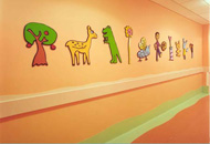 Lacquered cut-outs, crash barrier and skirting designs by Ray Smith, 2001. Bristol Royal Hospital for Children. Photo: Jerry Hardman-Jones.