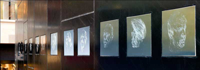 Copper etched portraits of site workers by the artist Dryden Goodwin are sited at eye level on one the main escalators at Cabot Circus. Photo: Insite Arts 2008