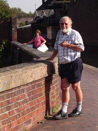 Two soundwalkers on the War Bar Soundwalk, Warwick Bar, Birmingham, West Midlands, Liminal, 2006.  Image courtesy of Liminal.