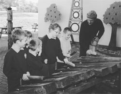 Rehearsal for orchestra work to mark opening of new school. Artist: Jony Esterby. Photo: Martin Avery