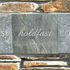Wall of words (detail), Trevena Square, Tintagel, 2005. Words: Amanda White; Artist and photographer, Michael Fairfax.