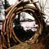 Link to larger image: Entrance, sculpture in wood by Andy Goldsworthy, 1986.Hooke Park Wood, near Beaminster, Dorset.Photo &copy; Common Ground.