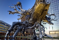 Dan Corson, Root. 2008. Bronze, specialty paint, and nurse tree. Bellevue City Hall, Bellevue, WA.