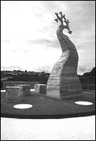 Eternal Parents a landmark sculpture by Steve Geliot in Cedar and Granite